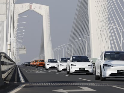 Dozens of Chery cars cross the bridge over the Yangtze River in the Chinese city of Wuhu on March 18.